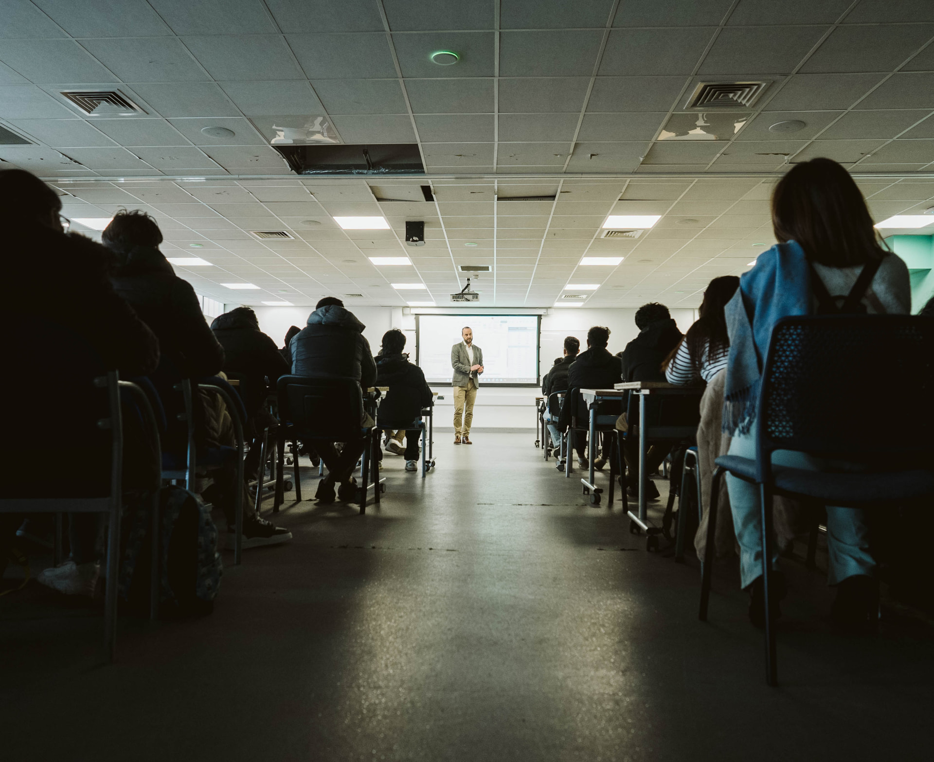 Students seated in a University of East London lecture theatre during an Educate2Trade seminar
