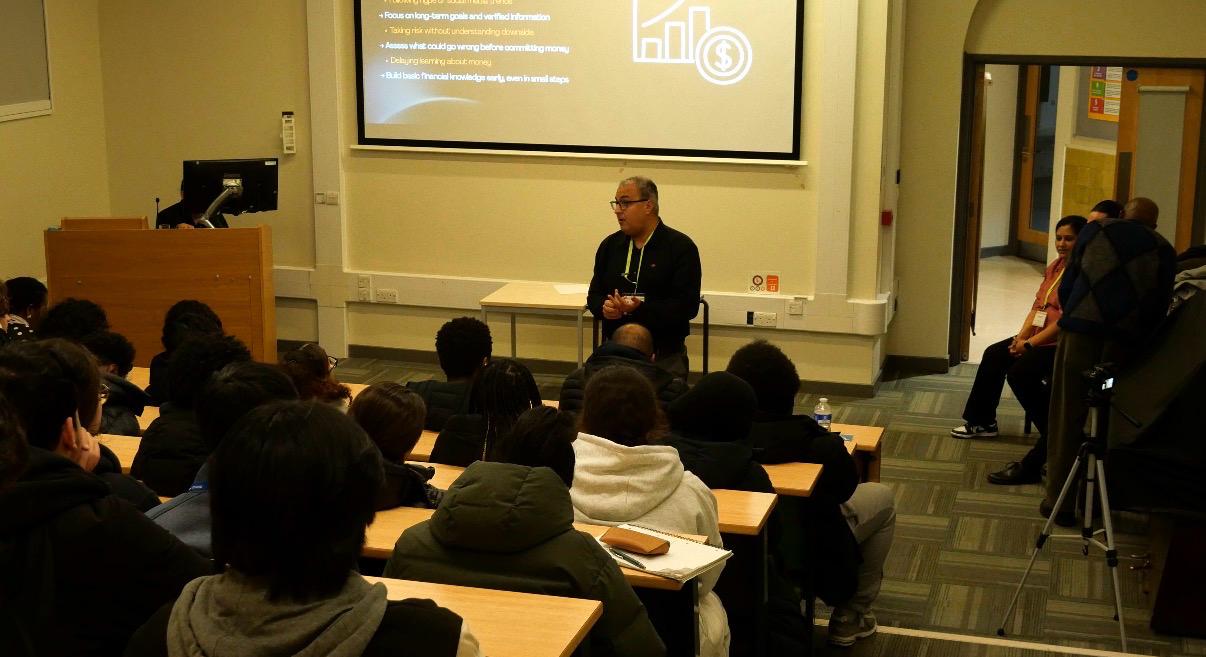 Full lecture theatre of Wandsworth College students during the seminar